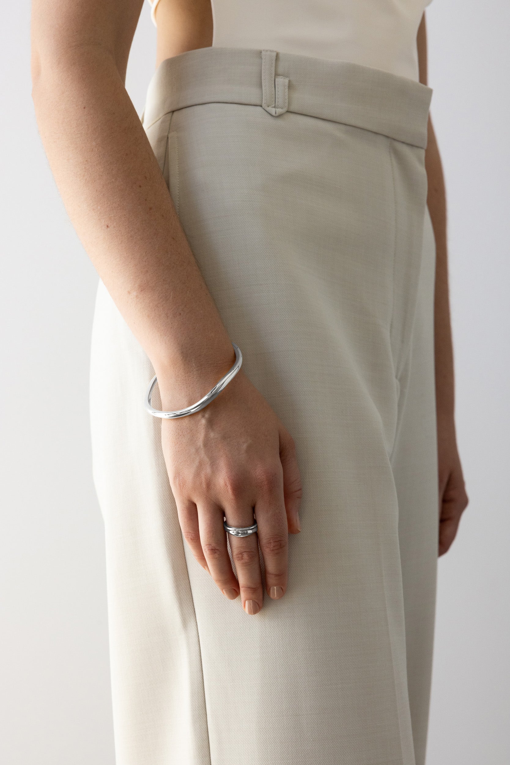 Flash Jewellery Fundamental Bangle in Sterling Silver on model hand by side