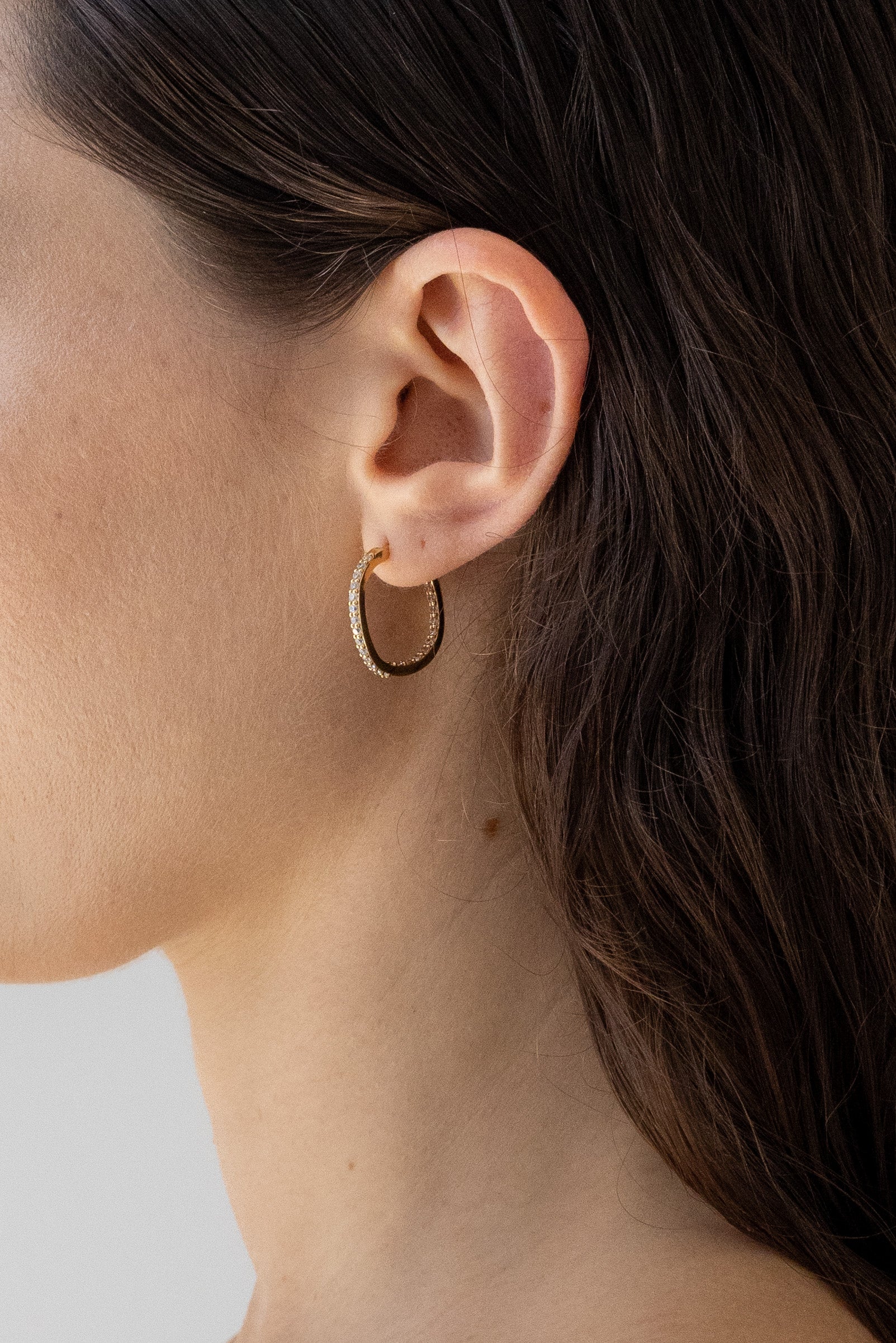 Flash Jewellery Jaunt Paved Hoop Earrings with Champagne coloured gemstones in 14k Gold Vermeil on model close up